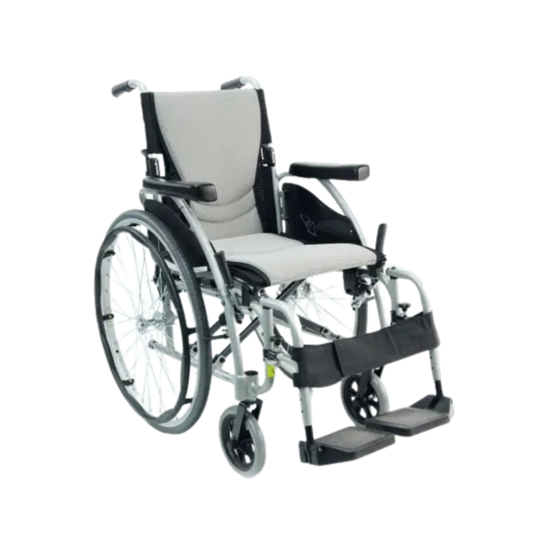 The Karman S-Ergo 125 Ergonomic Lightweight Wheelchair features a sleek gray design with large rear wheels, smaller front wheels, cushioned seat with S-shape ergonomic seating, supportive footrests, and flip-back armrests for added comfort.
